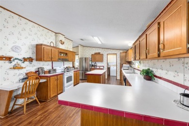 Welcome to this spacious 3-bedroom, 2-bathroom golf-course view on The Links of Spruce Creek in Florida - for sale on GolfHomes.com, golf home, golf lot