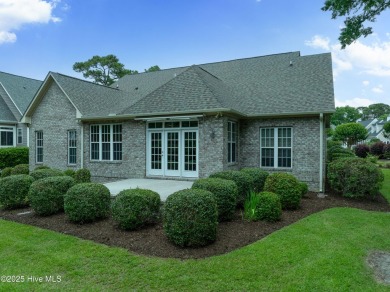 Nestled in a quiet cul-de-sac and backed by a serene pond shaded on Members Club At St. James Plantation in North Carolina - for sale on GolfHomes.com, golf home, golf lot