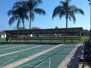 Great opportunity to own a beautifully maintained 2BR/2BA villa on Mainlands Golf Club in Florida - for sale on GolfHomes.com, golf home, golf lot