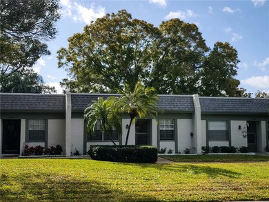Great opportunity to own a beautifully maintained 2BR/2BA villa on Mainlands Golf Club in Florida - for sale on GolfHomes.com, golf home, golf lot