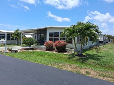 This lovely 1982 mobile home comes unfurnished and is poised and on Royal Wood Golf and Country Club in Florida - for sale on GolfHomes.com, golf home, golf lot