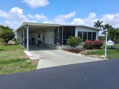 This lovely 1982 mobile home comes unfurnished and is poised and on Royal Wood Golf and Country Club in Florida - for sale on GolfHomes.com, golf home, golf lot