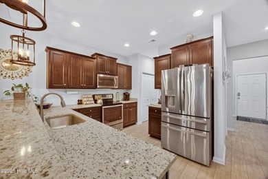 Discover low-maintenance living in the heart of Beacon Townes! on Carolina Shores Golf Course in North Carolina - for sale on GolfHomes.com, golf home, golf lot