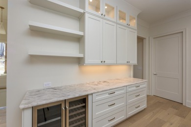 Experience refined living in this newly built custom home on Reynolds Lake Oconee - The Oconee in Georgia - for sale on GolfHomes.com, golf home, golf lot