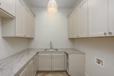 Experience refined living in this newly built custom home on Reynolds Lake Oconee - The Oconee in Georgia - for sale on GolfHomes.com, golf home, golf lot