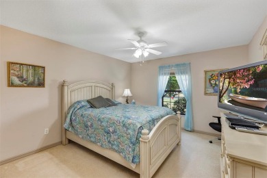 This home is a lovely Saint Augustine model with a few custom on Summerglen Country Club in Florida - for sale on GolfHomes.com, golf home, golf lot