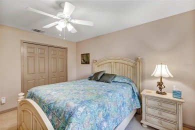 This home is a lovely Saint Augustine model with a few custom on Summerglen Country Club in Florida - for sale on GolfHomes.com, golf home, golf lot