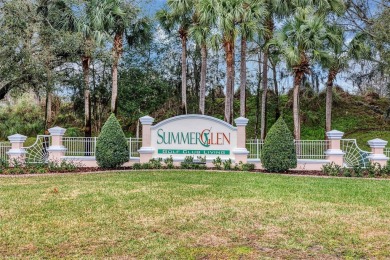 This home is a lovely Saint Augustine model with a few custom on Summerglen Country Club in Florida - for sale on GolfHomes.com, golf home, golf lot