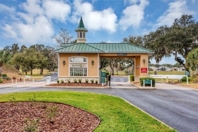 This home is a lovely Saint Augustine model with a few custom on Summerglen Country Club in Florida - for sale on GolfHomes.com, golf home, golf lot