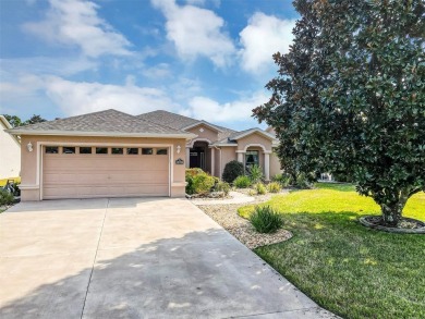 This home is a lovely Saint Augustine model with a few custom on Summerglen Country Club in Florida - for sale on GolfHomes.com, golf home, golf lot