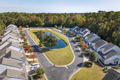 Discover low-maintenance living in the heart of Beacon Townes! on Carolina Shores Golf Course in North Carolina - for sale on GolfHomes.com, golf home, golf lot