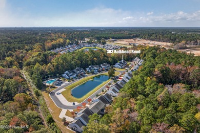 Discover low-maintenance living in the heart of Beacon Townes! on Carolina Shores Golf Course in North Carolina - for sale on GolfHomes.com, golf home, golf lot
