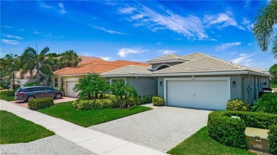 Discover the splendor of this exquisite lakeside residence on Arrowhead Golf Club At Heritage Greens in Florida - for sale on GolfHomes.com, golf home, golf lot