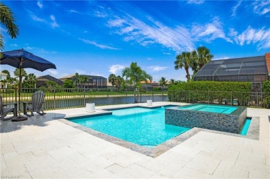 Discover the splendor of this exquisite lakeside residence on Arrowhead Golf Club At Heritage Greens in Florida - for sale on GolfHomes.com, golf home, golf lot