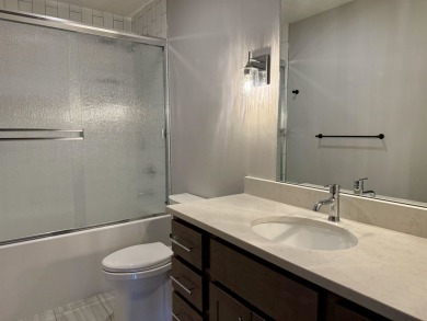 This 3-bedroom, 2-bath condo stands out in the Greater Lakes on Indian Hills Golf Club in Iowa - for sale on GolfHomes.com, golf home, golf lot