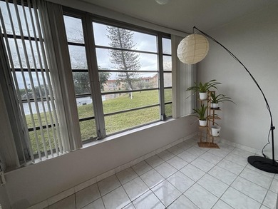 Welcome to THIS BRIGHT and STUNNING unit in a great 55+ on Sunrise Lakes Phase III in Florida - for sale on GolfHomes.com, golf home, golf lot