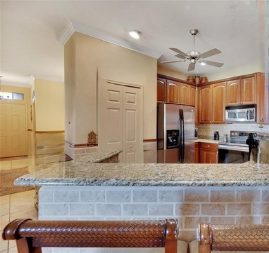 Welcome to this beautifully maintained Beachcomber model villa on Apollo Beach Golf and Sea Club in Florida - for sale on GolfHomes.com, golf home, golf lot