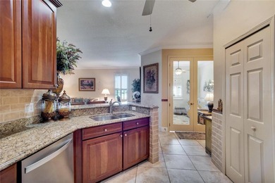 Welcome to this beautifully maintained Beachcomber model villa on Apollo Beach Golf and Sea Club in Florida - for sale on GolfHomes.com, golf home, golf lot