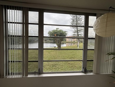 Welcome to THIS BRIGHT and STUNNING unit in a great 55+ on Sunrise Lakes Phase III in Florida - for sale on GolfHomes.com, golf home, golf lot