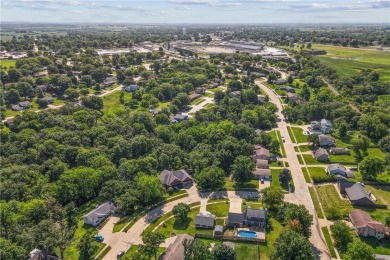 Discover your ideal entertainment haven in Knoxville, Iowa, a on Pine Knolls Country Club in Iowa - for sale on GolfHomes.com, golf home, golf lot