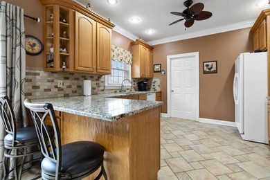 Beautiful 1.5-story home situated on a desirable corner lot in on Gibson Bay Golf Course in Kentucky - for sale on GolfHomes.com, golf home, golf lot