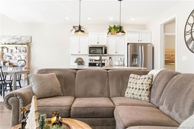 Welcome home to this beautifully designed 3-bedroom, 2-bath, 1 on Champions Pointe Golf Course in Indiana - for sale on GolfHomes.com, golf home, golf lot