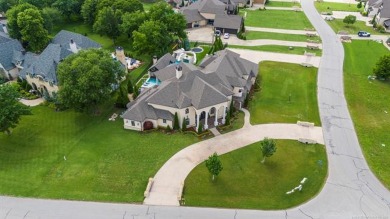 Immerse yourself in luxury with this stunning 5-bedroom, 5 on The Patriot in Oklahoma - for sale on GolfHomes.com, golf home, golf lot