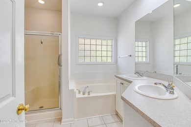 Discover relaxed coastal living in this charming 3-bedroom on Carolina National Golf Club in North Carolina - for sale on GolfHomes.com, golf home, golf lot