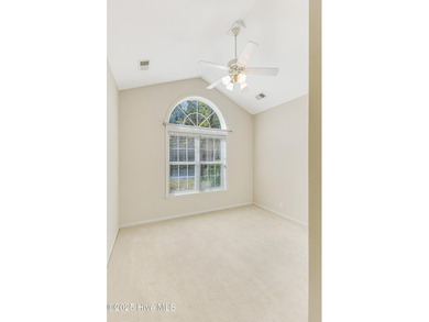 Discover relaxed coastal living in this charming 3-bedroom on Carolina National Golf Club in North Carolina - for sale on GolfHomes.com, golf home, golf lot