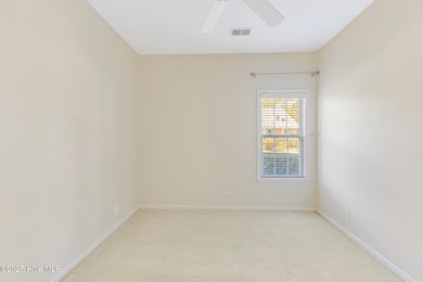 Discover relaxed coastal living in this charming 3-bedroom on Carolina National Golf Club in North Carolina - for sale on GolfHomes.com, golf home, golf lot