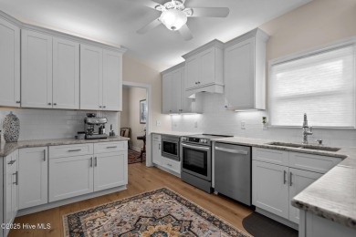 Discover resort-style living in this beautiful updated 3 bedroom on Porters Neck Country Club in North Carolina - for sale on GolfHomes.com, golf home, golf lot