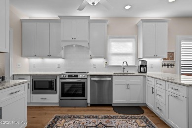 Discover resort-style living in this beautiful updated 3 bedroom on Porters Neck Country Club in North Carolina - for sale on GolfHomes.com, golf home, golf lot