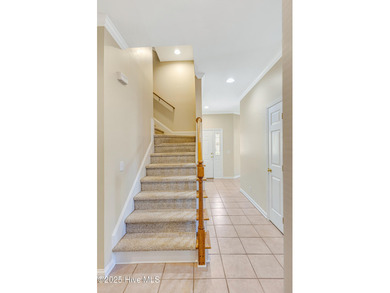 Discover relaxed coastal living in this charming 3-bedroom on Carolina National Golf Club in North Carolina - for sale on GolfHomes.com, golf home, golf lot