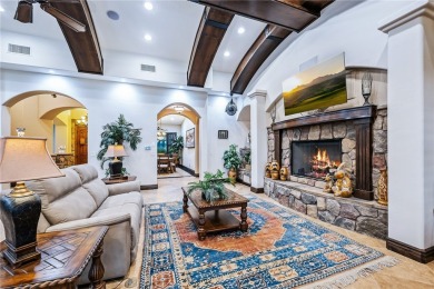 Nearly 6,000 Sq Ft of Purposeful Luxury with Dual Primary Suites on Laughlin Ranch Golf Club in Arizona - for sale on GolfHomes.com, golf home, golf lot