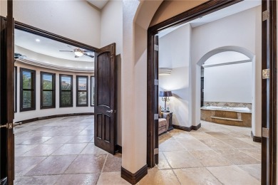 Nearly 6,000 Sq Ft of Purposeful Luxury with Dual Primary Suites on Laughlin Ranch Golf Club in Arizona - for sale on GolfHomes.com, golf home, golf lot