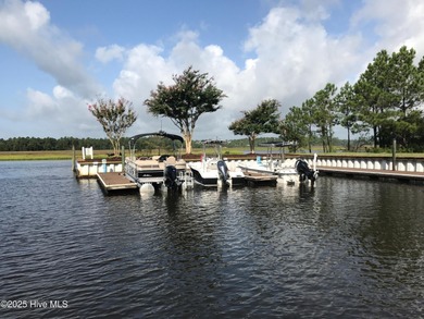 Discover relaxed coastal living in this charming 3-bedroom on Carolina National Golf Club in North Carolina - for sale on GolfHomes.com, golf home, golf lot