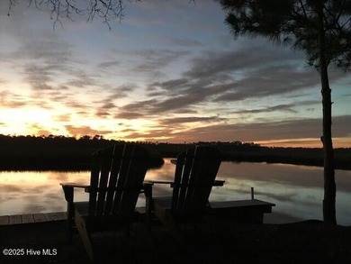 Discover relaxed coastal living in this charming 3-bedroom on Carolina National Golf Club in North Carolina - for sale on GolfHomes.com, golf home, golf lot