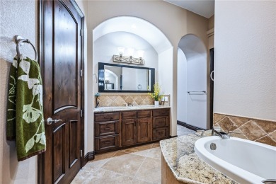 Nearly 6,000 Sq Ft of Purposeful Luxury with Dual Primary Suites on Laughlin Ranch Golf Club in Arizona - for sale on GolfHomes.com, golf home, golf lot
