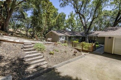 Custom-built luxury home on the peaceful wooded hillside. Enjoy on Castlewood Country Club in California - for sale on GolfHomes.com, golf home, golf lot