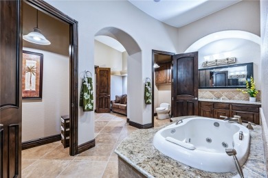 Nearly 6,000 Sq Ft of Purposeful Luxury with Dual Primary Suites on Laughlin Ranch Golf Club in Arizona - for sale on GolfHomes.com, golf home, golf lot