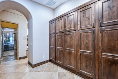 Nearly 6,000 Sq Ft of Purposeful Luxury with Dual Primary Suites on Laughlin Ranch Golf Club in Arizona - for sale on GolfHomes.com, golf home, golf lot