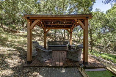 Custom-built luxury home on the peaceful wooded hillside. Enjoy on Castlewood Country Club in California - for sale on GolfHomes.com, golf home, golf lot