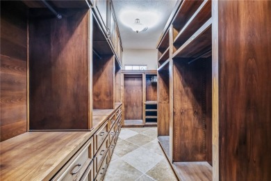 Nearly 6,000 Sq Ft of Purposeful Luxury with Dual Primary Suites on Laughlin Ranch Golf Club in Arizona - for sale on GolfHomes.com, golf home, golf lot