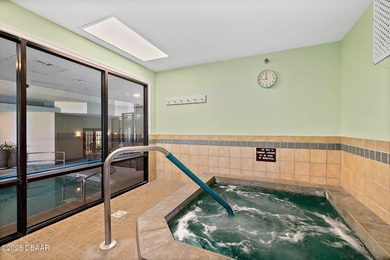 IN THE HEART OF DAYTONA BEACH SHORES, THIS CONDO BECKONS WITH on Oceans Golf Club in Florida - for sale on GolfHomes.com, golf home, golf lot