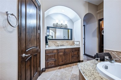 Nearly 6,000 Sq Ft of Purposeful Luxury with Dual Primary Suites on Laughlin Ranch Golf Club in Arizona - for sale on GolfHomes.com, golf home, golf lot