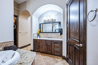 Nearly 6,000 Sq Ft of Purposeful Luxury with Dual Primary Suites on Laughlin Ranch Golf Club in Arizona - for sale on GolfHomes.com, golf home, golf lot