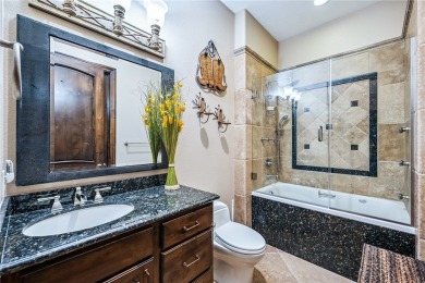 Nearly 6,000 Sq Ft of Purposeful Luxury with Dual Primary Suites on Laughlin Ranch Golf Club in Arizona - for sale on GolfHomes.com, golf home, golf lot