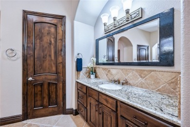 Nearly 6,000 Sq Ft of Purposeful Luxury with Dual Primary Suites on Laughlin Ranch Golf Club in Arizona - for sale on GolfHomes.com, golf home, golf lot