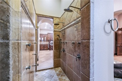 Nearly 6,000 Sq Ft of Purposeful Luxury with Dual Primary Suites on Laughlin Ranch Golf Club in Arizona - for sale on GolfHomes.com, golf home, golf lot