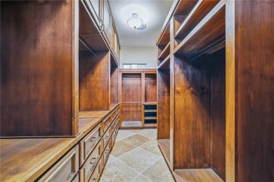 Nearly 6,000 Sq Ft of Purposeful Luxury with Dual Primary Suites on Laughlin Ranch Golf Club in Arizona - for sale on GolfHomes.com, golf home, golf lot